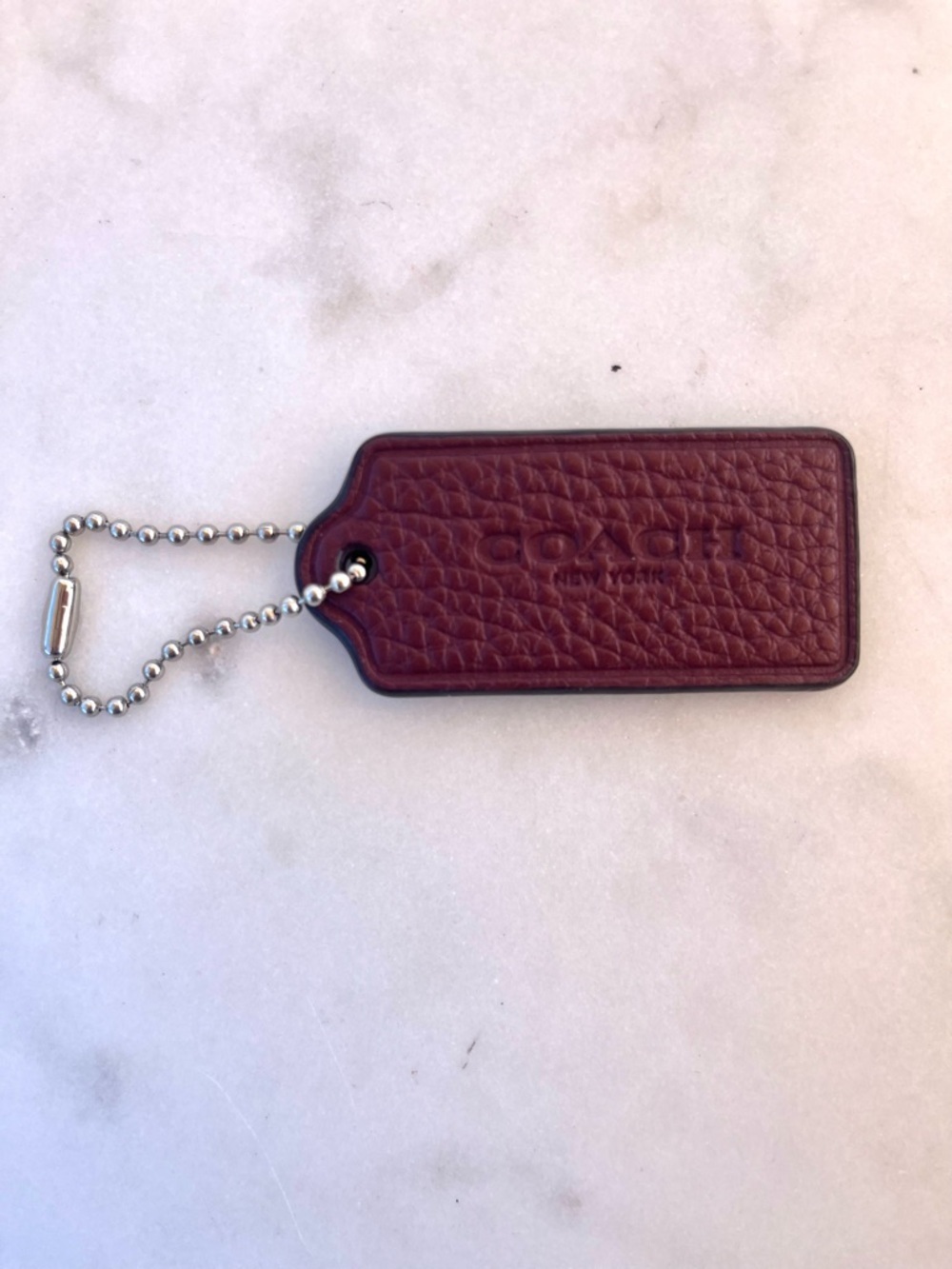 COACH Pebbled Leather Hang Tag, Maroon
